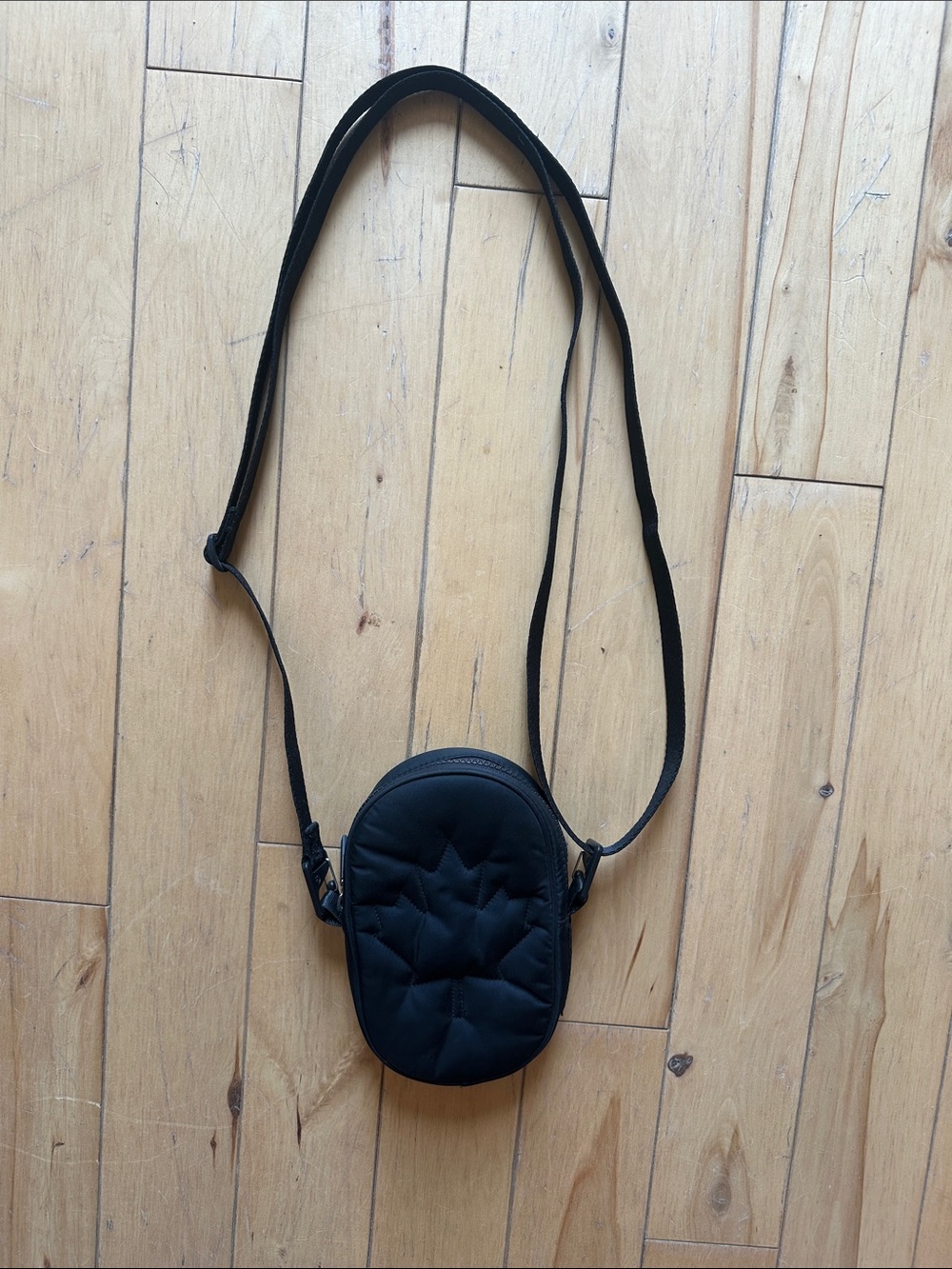 lululemon athletica Black Quilted Oval Crossbody Bag